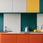 Residential interior of modern kitchen.Modern new light interior of kitchen with white furniture and dining table.Interior of modern comfortable kitchen